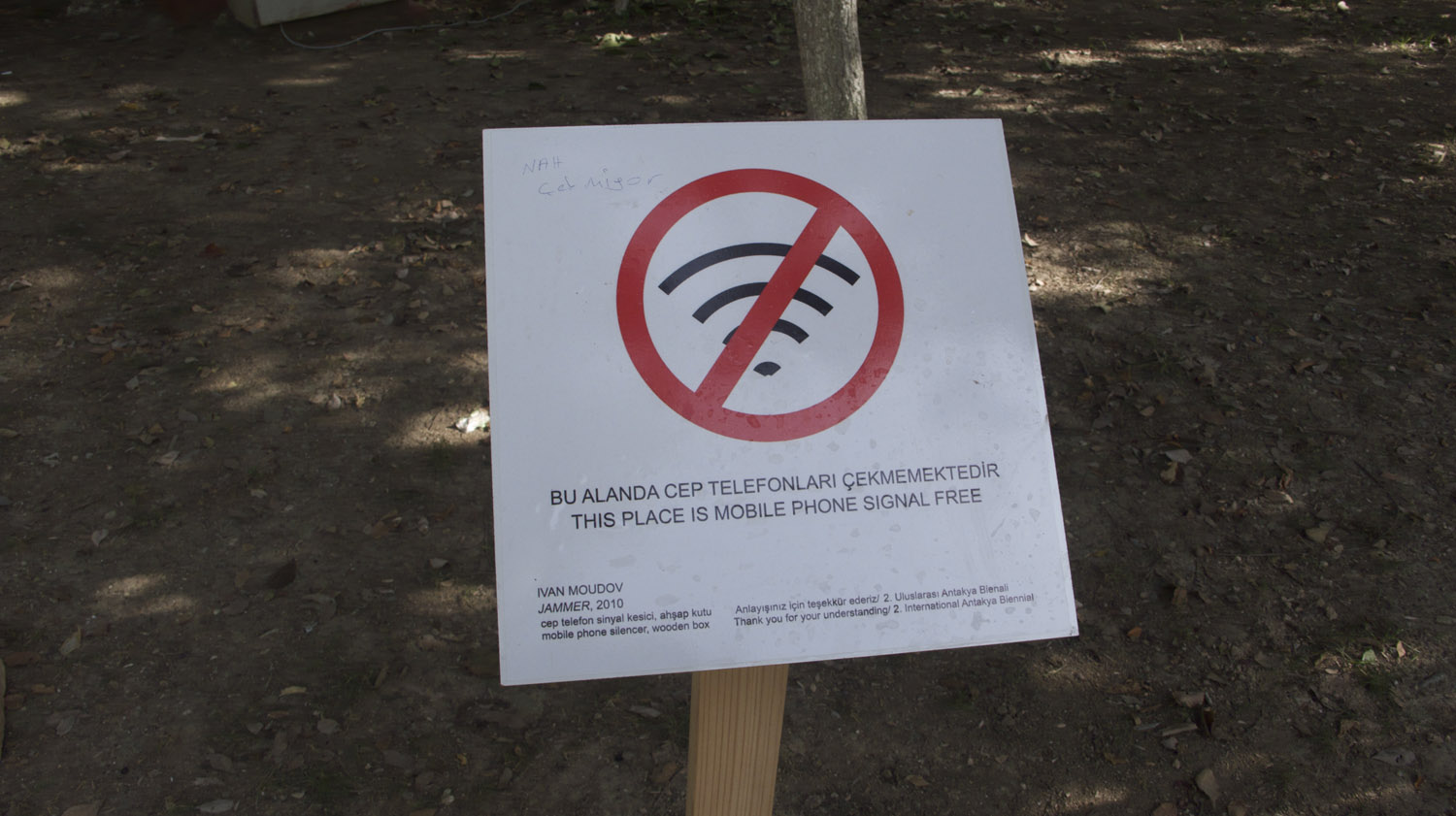 Jammer, 2010. Jammer, bench, sign. Installation view, 2nd Antakya Biennial, 2010.